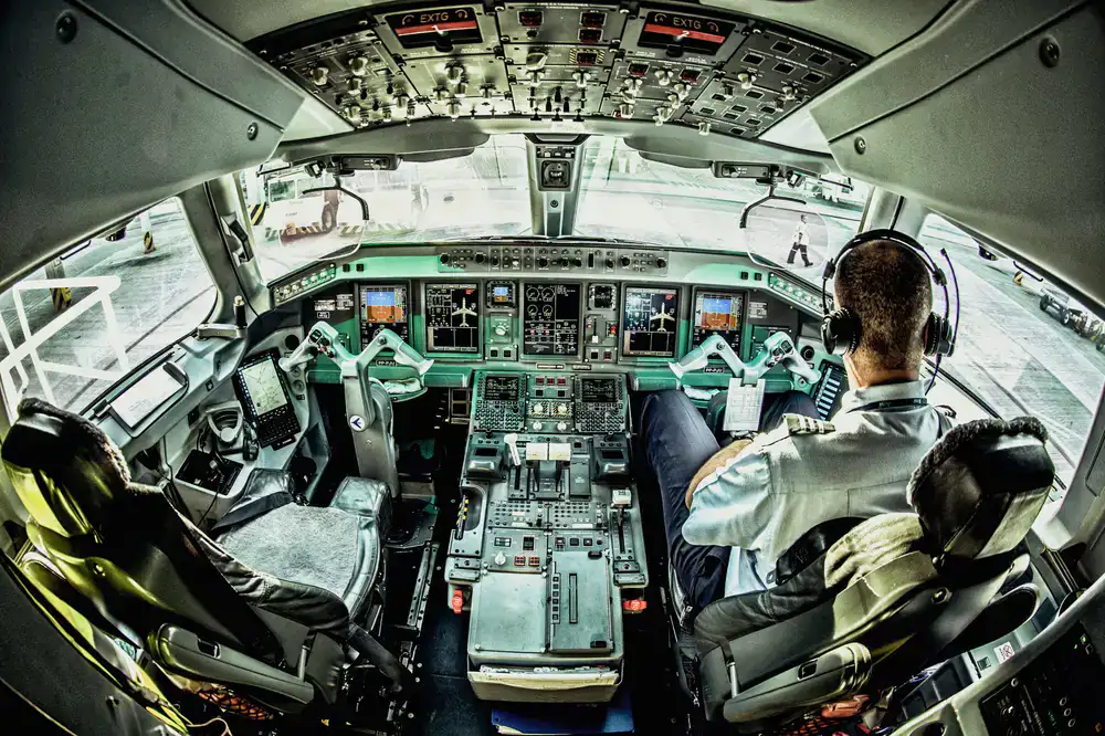Commercial airliner simulator from behind the captain seat